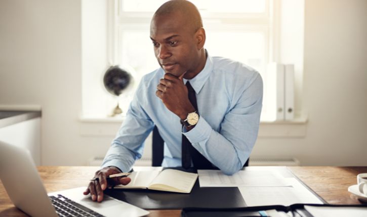 man working on his laptop for work